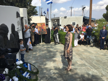 Theresa Villiers lays at wreath at the Morphou Rally