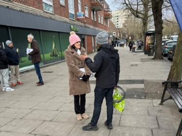 Theresa Villiers collects signatures in Whetstone on her petition against new bus lanes