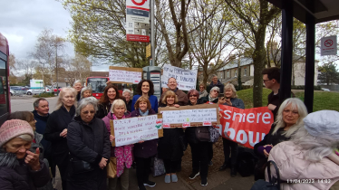 Theresa Villiers takes part in protest calling for the return of the 84 bus