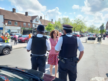 Theresa Villiers chats to neighbourhood police officers in New Barnet
